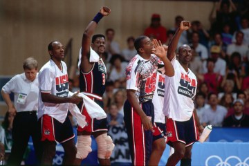 Image: Clyde Drexler, Patrick Ewing, Magic Johnson and Michael Jordan of the United States celebrate their win against Croatia during the Gold Medal Basketball game at the 1992 Olympics on August 8, 1992 in Barcelona, Spain.