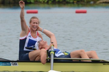Great Britain's Helen Glover and Heather Stanning celebrate after winning