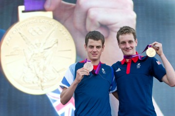 The Brownlee brothers show off their medals at the London 2012 Olympics