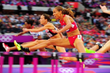Image: Lolo Jones competes in the Women's 100m hurdles semifinals at the Summer Olympic Games at Olympic Stadium in London on Tuesday, Aug. 8.